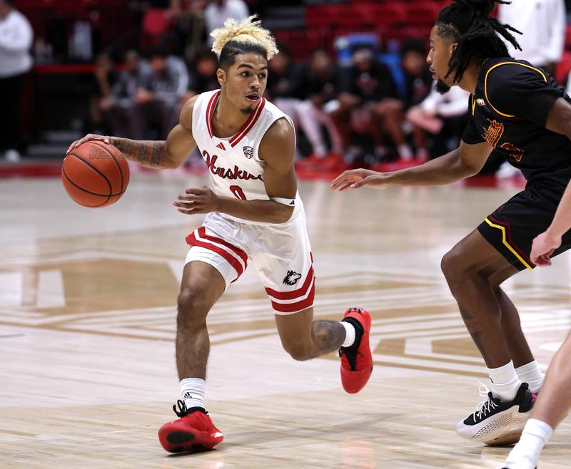 Northern Illinois guard Gianni Cobb works against Louisiana-Monroe guard Krystian Lewis Monday, Nov. 3, 2025, during their game at the Convocation Center at NIU in DeKalb.