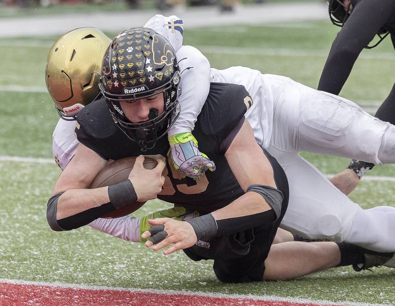 Lena-Winslow's Aiden Wild punches it in for a touchdown for the first score of the game for the Panthers against Althoff Catholic Friday, Nov. 29, 2024, in the class 1A football state final.