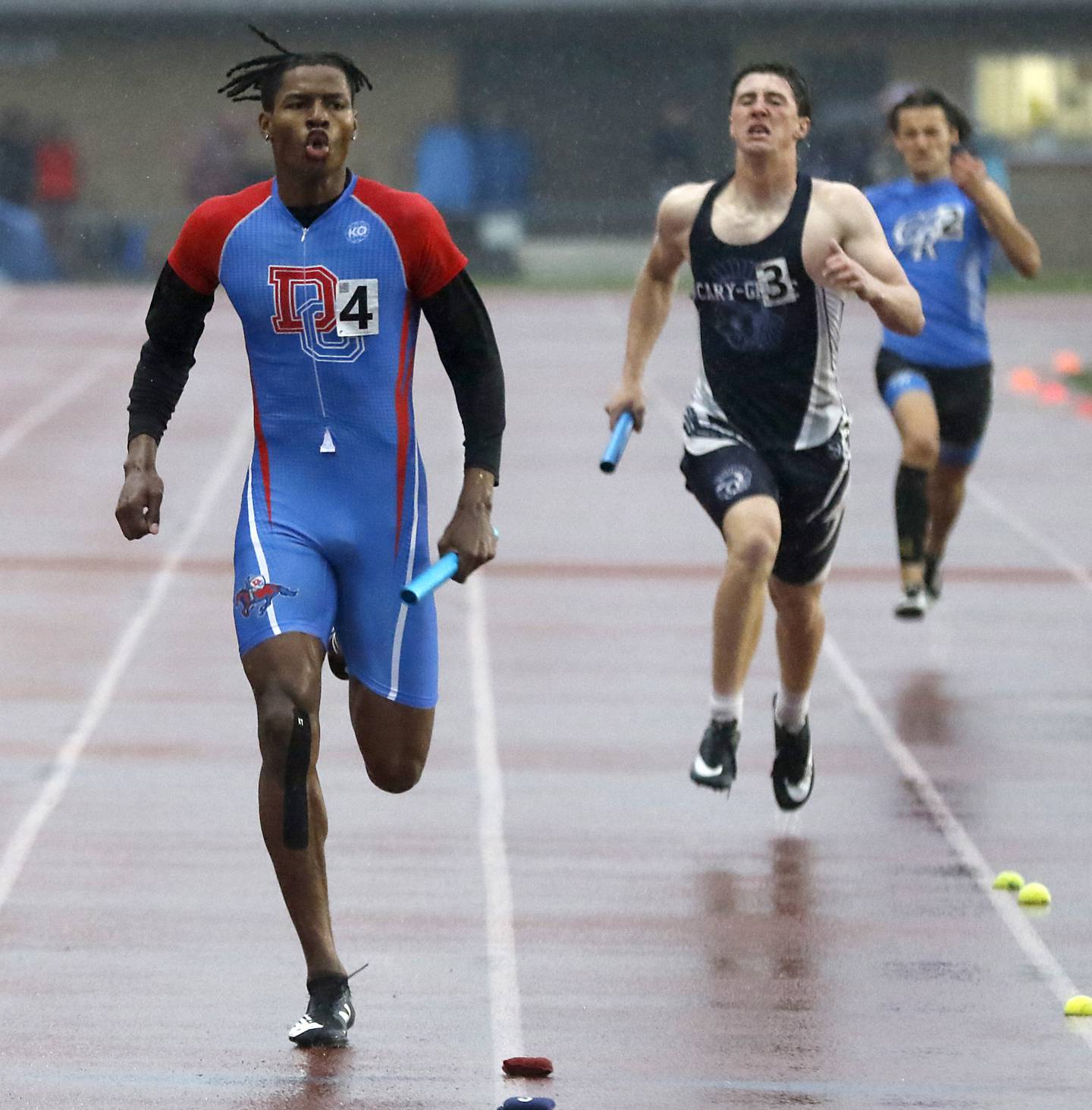 Dundee-Crown’s Kali Freeman anchors the 4x200 meter relay teams to victory Friday, May 12, 2023, during the Fox Valley Conference Boys Track and Field Meet at Huntley High School.