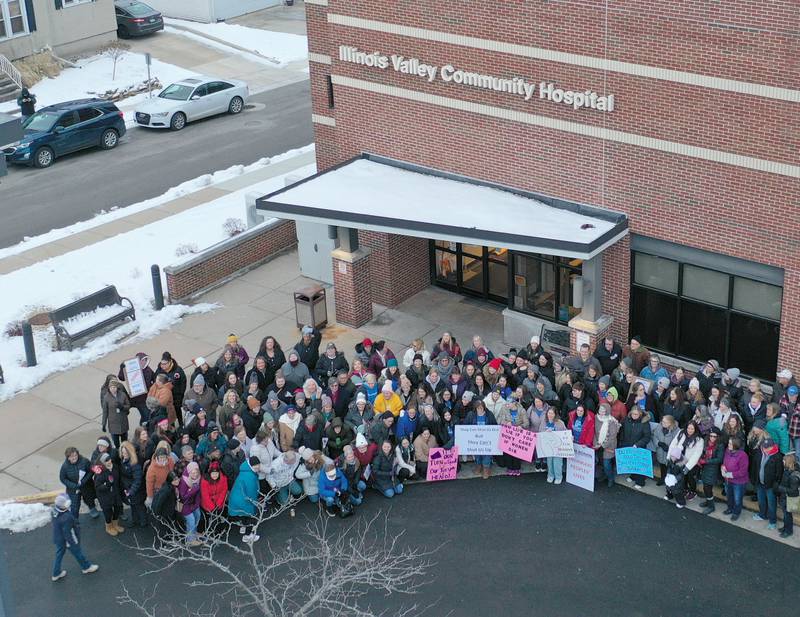 St. Margaret's employees gather outside outside St. Margarets Hospital (formally Illinois Valley Community Hospital) on Saturday, Jan. 28, 2023 in Peru. Employees and former employees gathered at the hospital after it closed at 7a.m. on Saturday morning. Hospital officials announced late last Friday their plans to suspend operations at St. Margaret's Health in Peru.