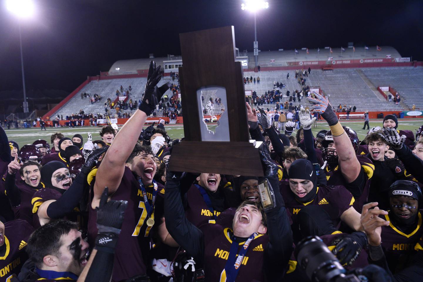 Montini players celebrate their 47-33 victory over Rochester during the IHSA Class 4A state championship game on Friday, Nov. 28, 2025 in Normal.