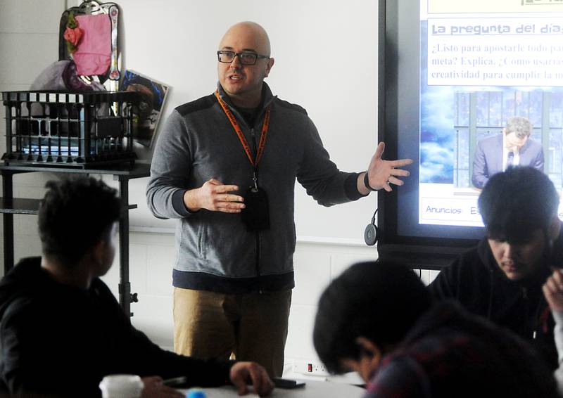 Otto Corzo teaches a Spanish literature class Monday, April 11, 2022, at McHenry High School. Corzo was named a Golden Apple finalist this year for his teaching.