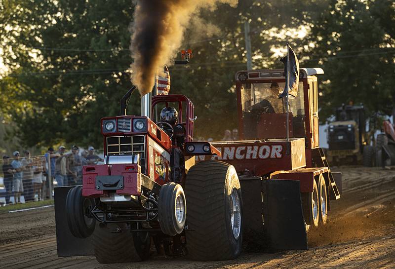 Tom Gallitz works his “Running in the Red” limited pro tractor Wednesday, Aug. 7, 2024 at the Carroll County Fair.
