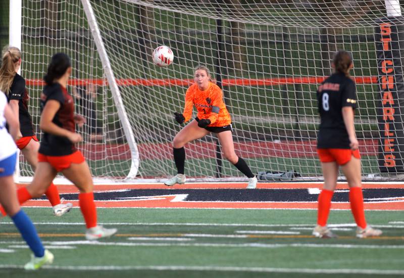 St. Charles East's Sidney Lazenby makes a save in the goal during a Tri-Cities Soccer Night game against St. Charles North on Tuesday, April 29, 2025 in St. Charles.