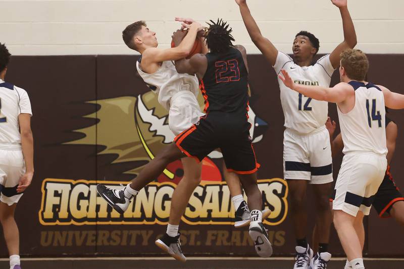 Lemont’s Deividas Bilevicius steals the ball from Romeoville’s Denonte Cunningham in the WJOL Thanksgiving Classic Championship in Joliet on Saturday.