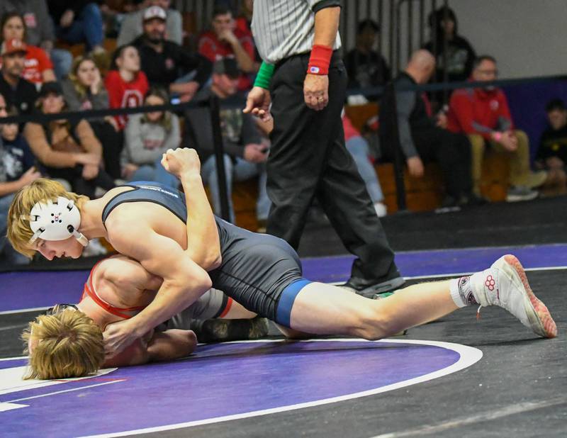 Ty Edwards of Yorkville Christian pins St. Ignatius during the 120-pound championship match up on Saturday at the Plano Reaper Classic held at Plano High School.