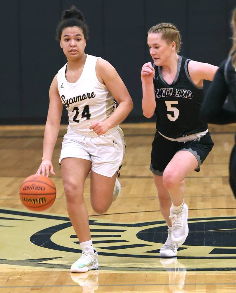 Sycamore's Monroe McGhee pushes the ball upcourt against Kaneland's Brigid Gannon during the Class 3A regional final game Friday, Feb. 17, 2023, at Sycamore High School.