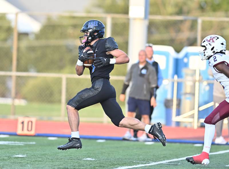 Lincoln Way East's Blaise LaVista (1) catches a pass and sprints to the end zone during the non-conference game against Kankakee on Friday, Sept. 05, 2025, at Frankfort.