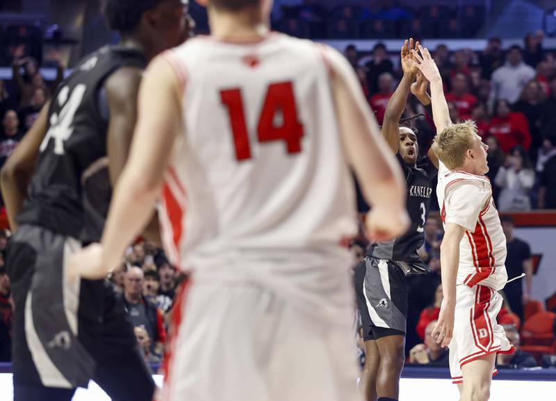 Kaneland's Marshawn Cocroft (3) watches his last second overtime shot fall short against Deerfield during the IHSA Class 3A boys basketball state semifinal Friday, March 13, 2026 at the State Farm Center in Champaign.