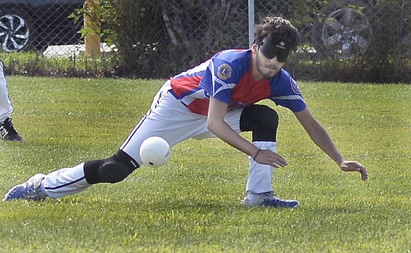 Chicago Comets Alex Gamino prepares to grab the beeping ball on a play during the first inning Saturday, Aug. 19, 2023, of a beep baseball game against the Hardscrabble Lions volunteers at Northlawn School in Streator.