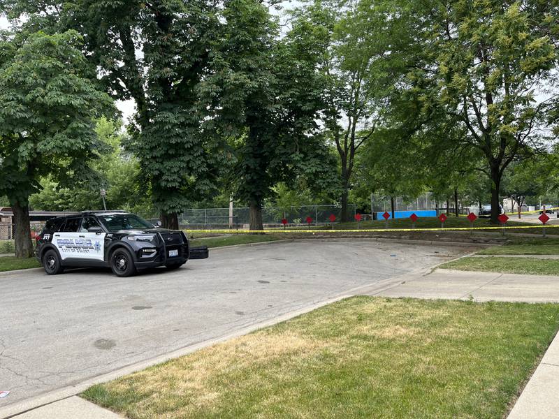 A Joliet police squad vehicle in the 600 block of East Benton Street on Tuesday, June 6, 2023, in Joliet. A 20-year-old man was shot in the head and died the same day.