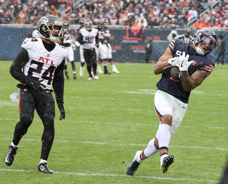 Chicago Bears wide receiver DJ Moore makes a catch during their game against the Atlanta Falcons Sunday, Dec. 31, 2023, at Soldier Field in Chicago.