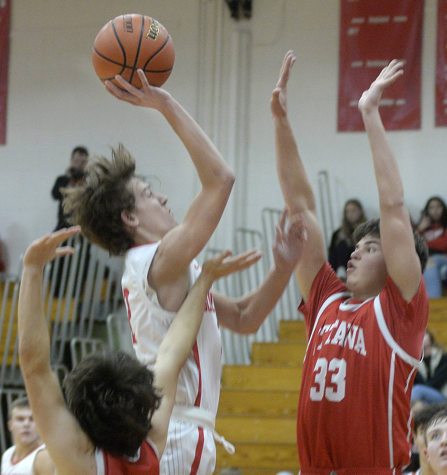 Streator's Matt Williamson rises for a shot while being defended by Ottawa's Cooper Knoll (33) Saturday, Dec. 10, 2022, at Pops Dale Gymnasium in Streator.