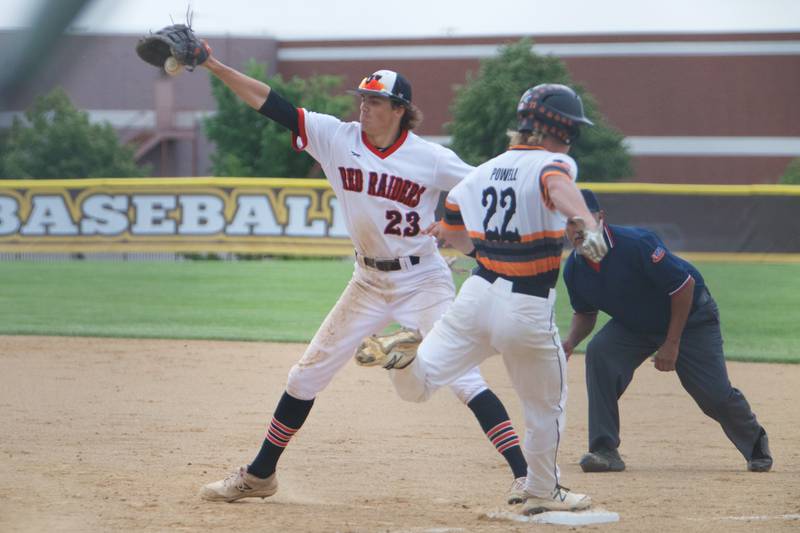 McHenry's Ricky Powell beats the throw to Huntley's First baseman Chase Jetel at the Class 4A Sectional Final on June 4, 2022 in Algonquin.