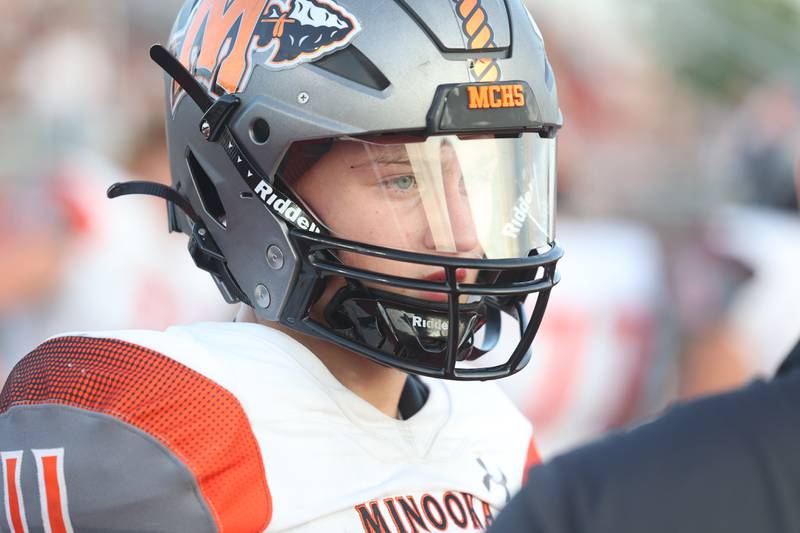 Minooka’s Gavin Dooley stands on the sidelines between series against Bolingbrook. Friday, Aug. 26, 2022, in Bolingbrook.