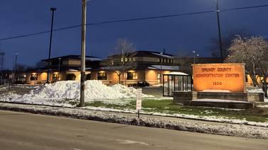 Grundy County Board honors Coroner John Callahan, others for years of service