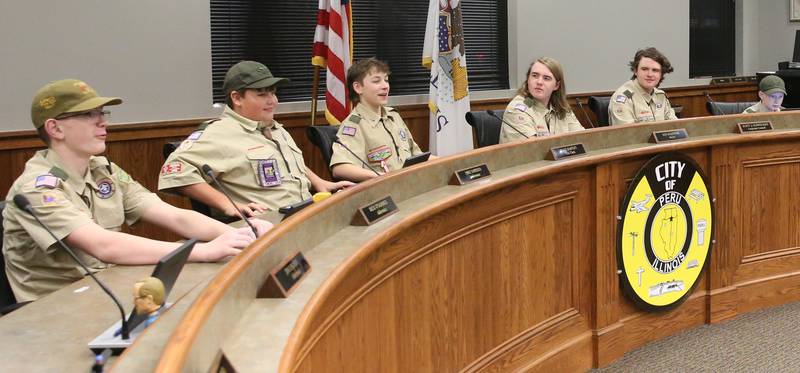 Peru Boy Scout Troop #123 (from left) Andrew Olivero, Brayden Lindbergh, Gabriel Bunch, Zayden O'dell, Desmond O'dell and Fin Paul sit in the council chamber on Thursday, Jan. 23, 2025 inside Peru City Hall. The troop asked questions to Peru Mayor Ken Kolowski while earning their citizenship in the community merit badge. Members asked questions and learned how Peru functions as a city of government.
