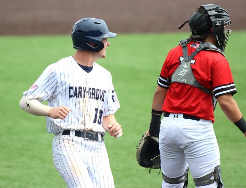 Cary-Grove’s Jacob Duvall scores against Triad in IHSA Class 3A Third Place Game baseball action at Slammer Stadium in Joliet on Saturday, June 14, 2025.