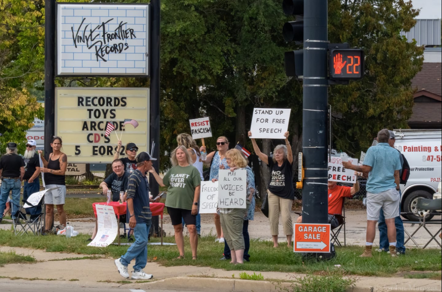 People protesting against comments made by Vinyl Frontier Records' owner over the assassination of Charlie Kirk along with people protesting free speech rights in McHenry on Sept. 20, 2025.