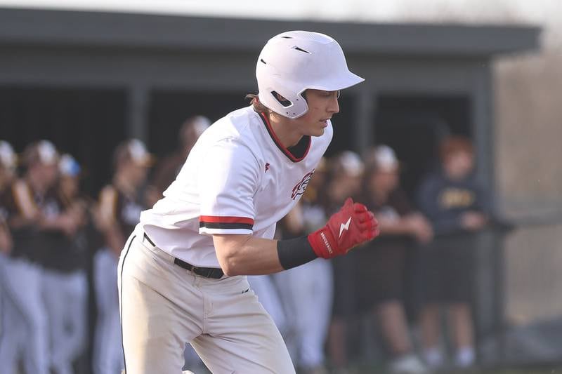 Lincoln-Way Central’s Shawn Mowry heads to first base to drive in a run against Joliet Catholic on Wednesday, March 25, 2026 in New Lenox.