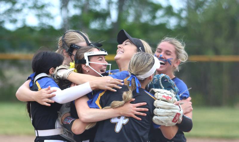 Aurora Central Catholic’s Chargers celebrate a 4-3 win over Marengo in varsity girls softball IHSA Class 2A Regional Title Game action on Friday, May 22, 2026 at Raymond Benoy Field on the campus of Marian Central High School in Woodstock.