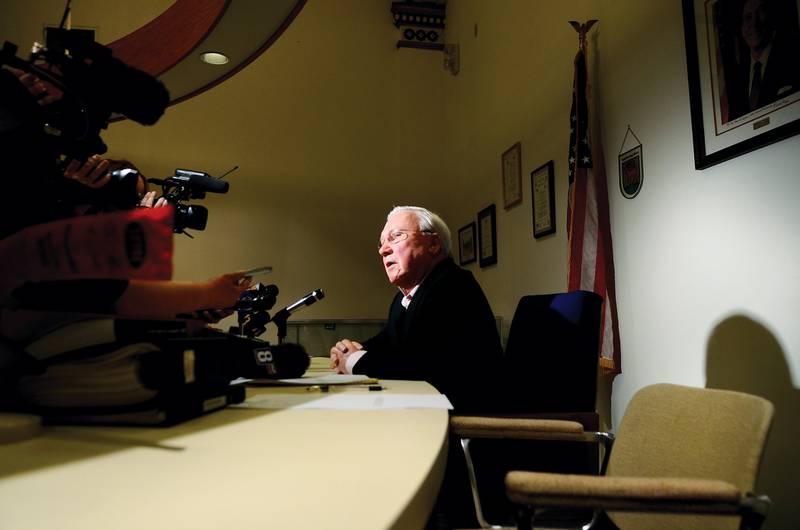 Dixon mayor Jim Burke speaks with the media following a special city council meeting Monday, April 23, 2012 that officially fired arrested city comptroller Rita Crundwell.