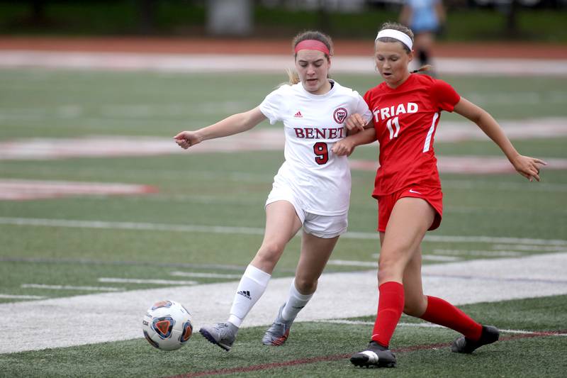 Benet’s Keira Petrucelli (9) and Triad’s Macy Mell (11) go after the ball during the IHSA Class 2A state championship game at North Central College in Naperville on Saturday, June 4, 2022.