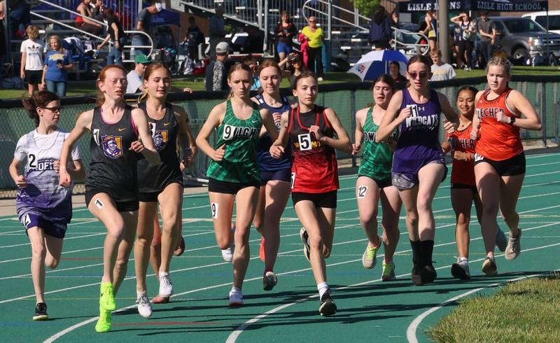 Runners race in the 3200 meter run during the Class 1A Sectional meet on Thursday, May 14, 2026 at Seneca High School.