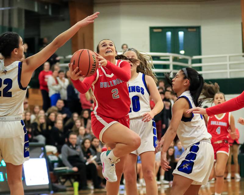 Batavia's Brooke Carlson (2) puts up a shot during Class 4A Glenbard West Sectional final game between Geneva at Batavia.  Feb 23, 2023.