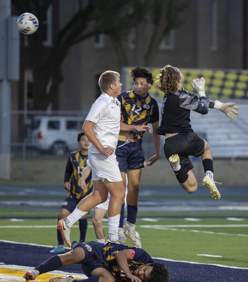 Sterling’s Adrian Cervantes heads the ball into the net against Geneseo Tuesday, October. 1, 2024, at Sterling High School. After the play, the officials ruled Cervantes offsides.