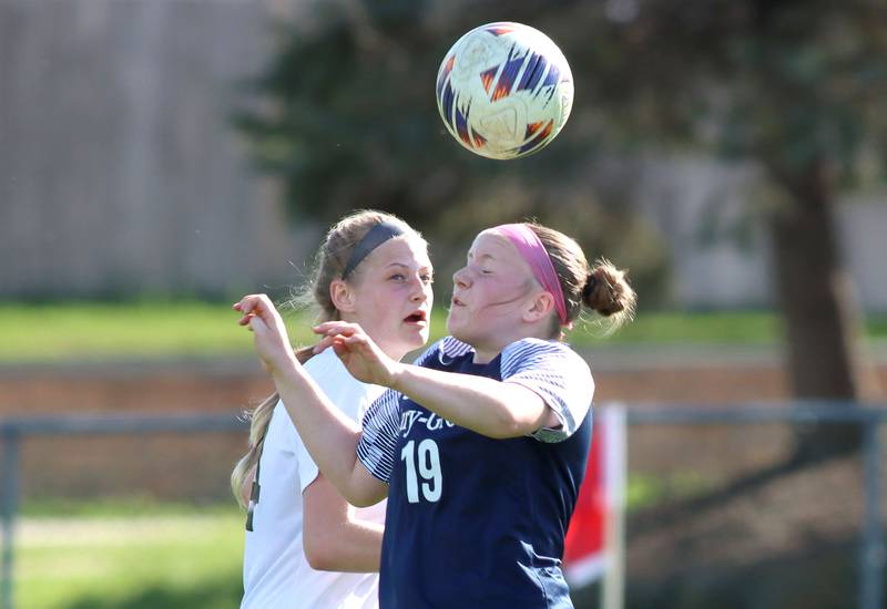 Cary-Grove’s Avery Brown, front, battles Prairie Ridge’s Sarah Mayes  in varsity girls soccer at Cary-Grove High School in Cary on Tuesday, April 29, 2025.