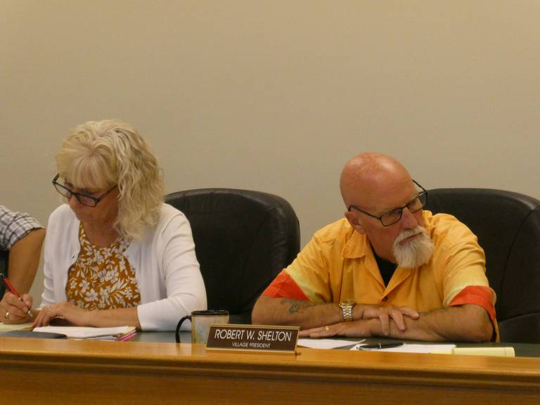 Hebron President Robert Shelton, center, appointed a new village treasurer during Monday's meeting, Aug. 22, 2022, citing past disagreements with now-former treasurer Susan Fotland.