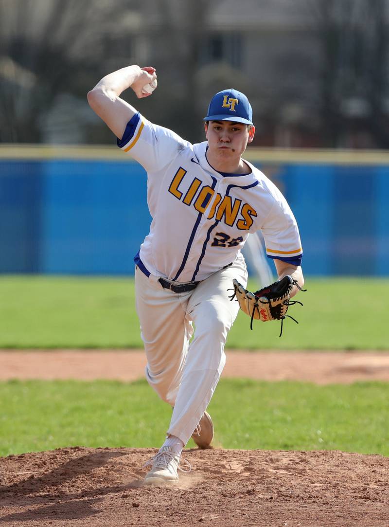 Lyons Township's Brady Chambers (22) pitches during the boys varsity baseball game between Lyons Township and Downers Grove North high schools in Western Springs on Tuesday, April 11, 2023.