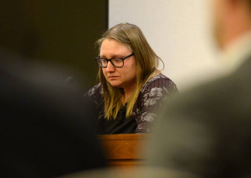 Cassie Baal, the sister of Melissa Lamesch, tearfully testifies about the last time she spoke with her sister as she testifies for the prosecution at the Matthew Plote trial at the Ogle County Judicial Center in Oregon on Thursday, March 21, 2024.