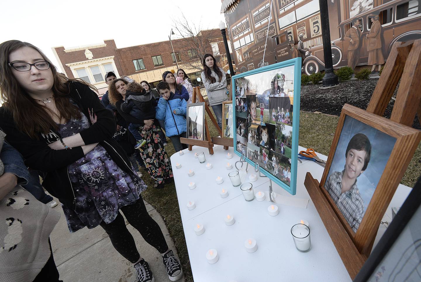 Photos of Dalton Mesarchik were on display for those gathered Sunday, March 26, 2023, at Heritage Park in Streator during a memorial on the 20th anniversary of his murder.