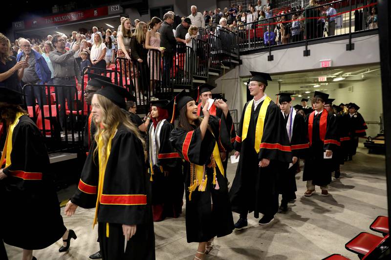 Batavia High School graduates enter the arena during the school’s 2023 commencement ceremony at Northern Illinois University in DeKalb on Wednesday, May 24, 2023.