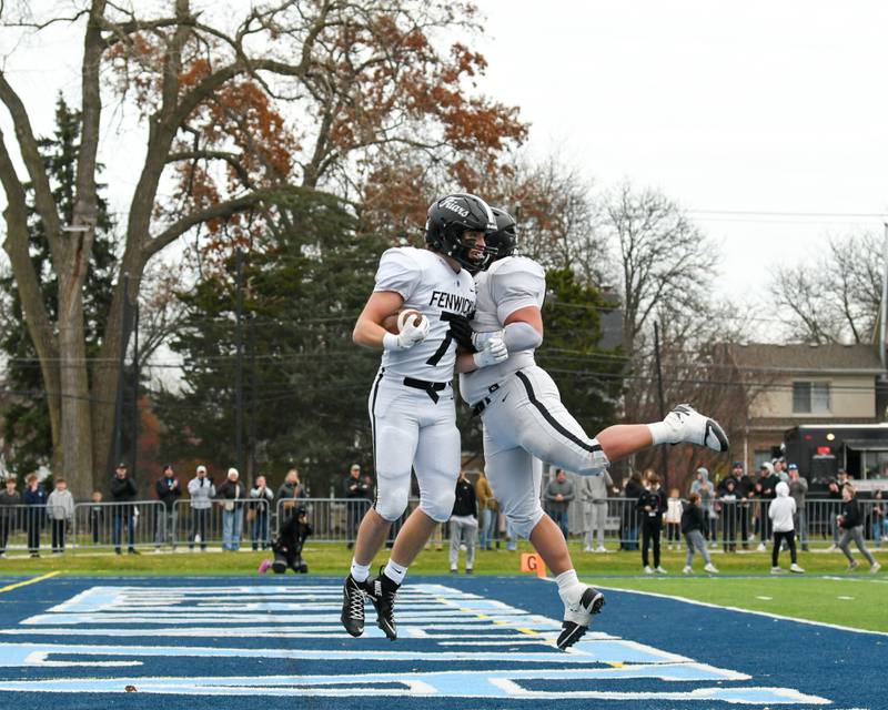 Fenwick's Tommy Thies (7) celebrates his touchdown with teammate Kam Rutlin (55) in the 6A semifinals game on Saturday Nov. 22, 2025; while taking on Nazareth Academy held at Nazareth Academy High School in La Grange Park.