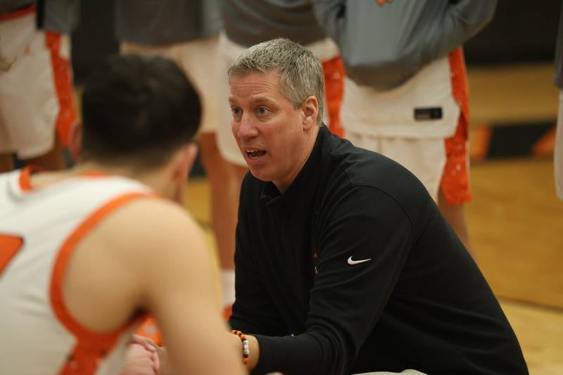 Lincoln-Way West head coach Tanner Mitchell takes to the team between periods against Plainfield Central on Saturday, Jan 3, 2026 in New Lenox.
