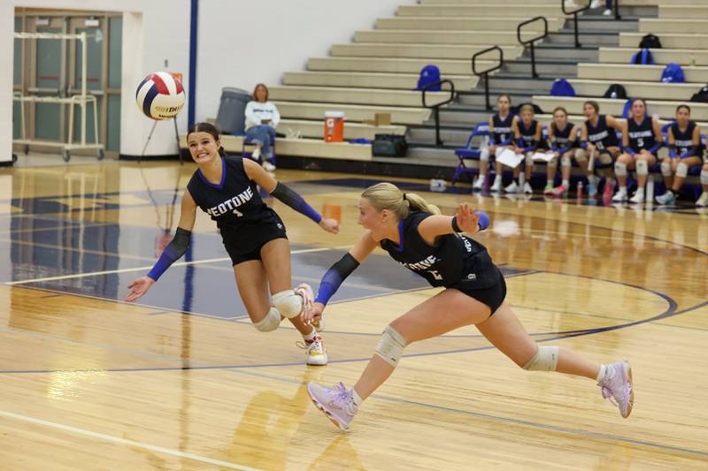 Peotone's Olivia Moe, left, and Peyton Bisping attempt to save a deflected hit during the Blue Devils' loss in three sets, 19-25, 25-19, 25-21, to Manteno on Tuesday, Sept. 23, 2025.
