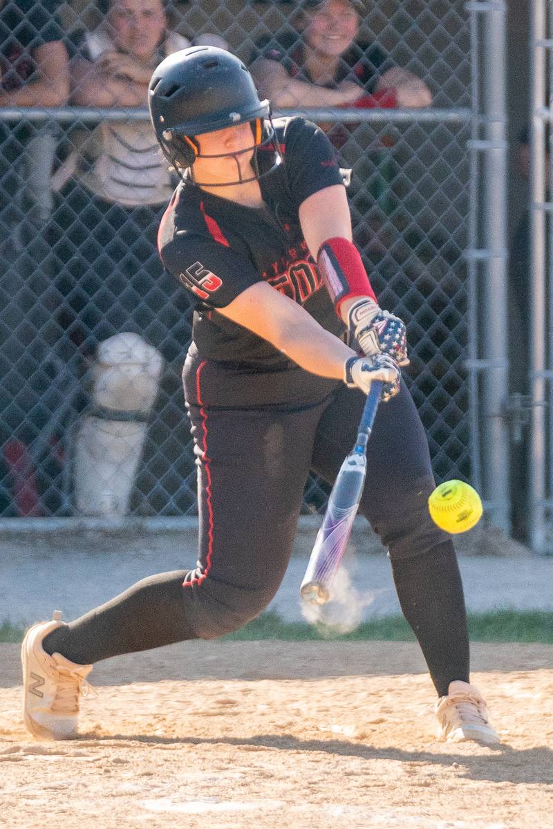 Yorkville's Regan Bishop (15) singles against Plainfield North during the Class 4A Yorkville Regional softball final at Yorkville High School on Friday, May 26, 2023.