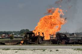 Ruptured gas line fuels construction equipment fire in Oswego