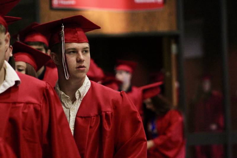 Graduates file through Dillon Mall on the way to the commencement on Friday, May 12, 2023, at Sauk Valley Community College.