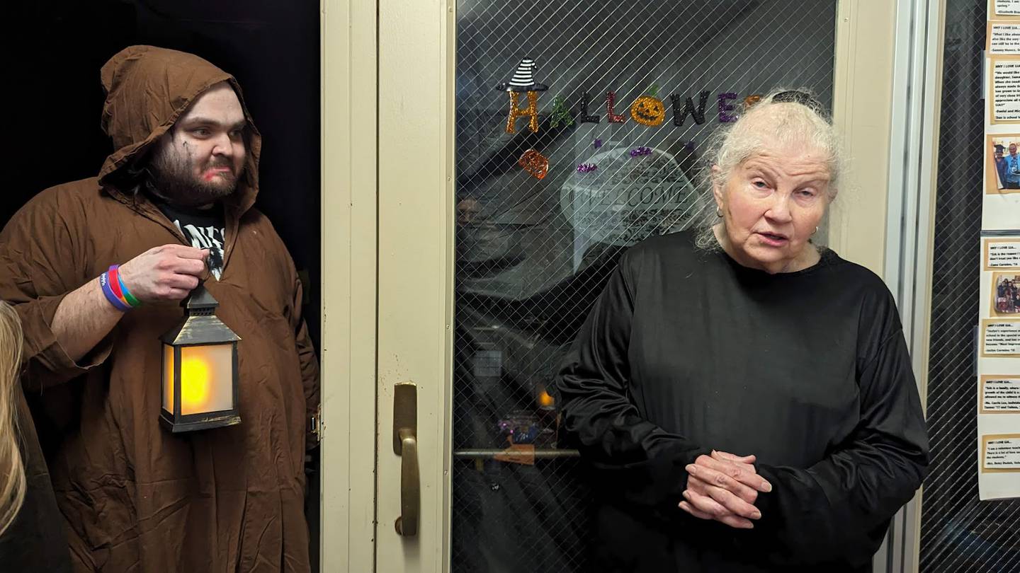 St. Joseph Academy in Joliet hosts the annual haunted attraction as a fundraiser for its school – and the event has families in mind from start to finish. Pictured, from left, is Teddy Lucas as the grim reaper and Jan Novotny, head of school.