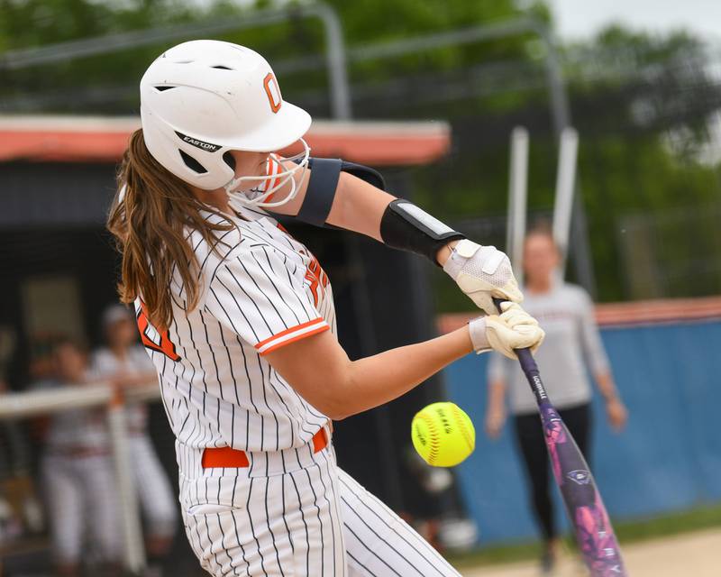 Oswego's Betsy Jack (19) makes contact with the ball during the regional final game on Friday May 22, 2026, while taking on Benet Academy held at Oswego High School.