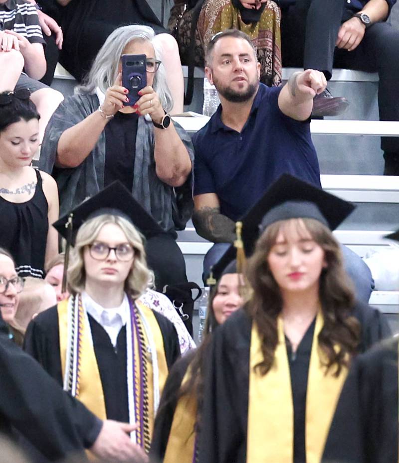 Friends and family look for their graduates as they enter for commencement ceremonies Sunday, May 28, 2023, at Sycamore High School.