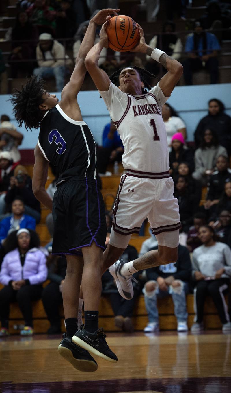 Kankakee's Lincoln Williams makes a drive to the net as Thornton's Montana Fontanez, left, guards in a game on Friday, December 12, 2025.