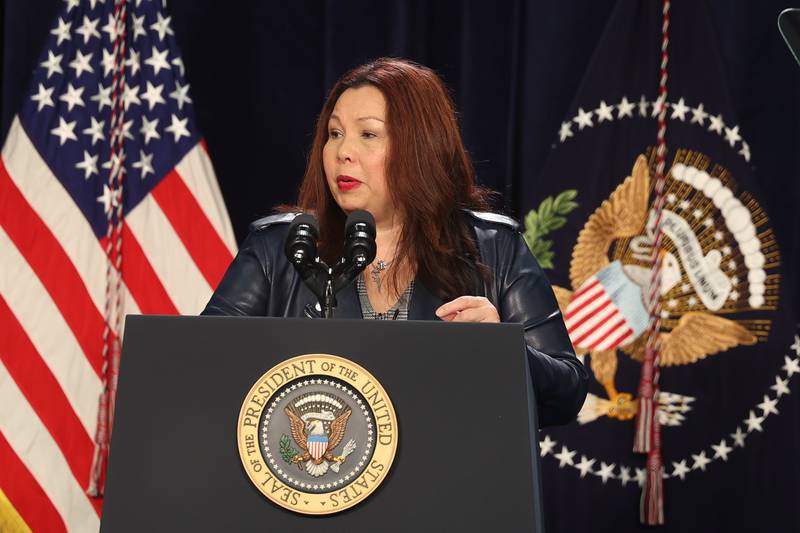 Senator Tammy Duckworth speaks before President Joe Biden takes the stage during his stop in Joliet at Jones Elementary School on Saturday.