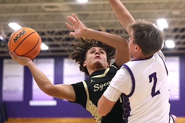 Photos: Sycamore boys basketball travels to Rochelle for a conference matchup