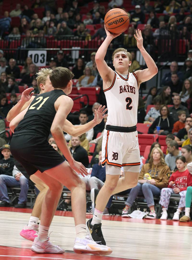 DeKalb’s Sean Reynolds shoots over Sycamore's Ben Larry Friday, Jan. 26, 2024, during the FNBO Challenge in the Convocation Center at Northern Illinois University.