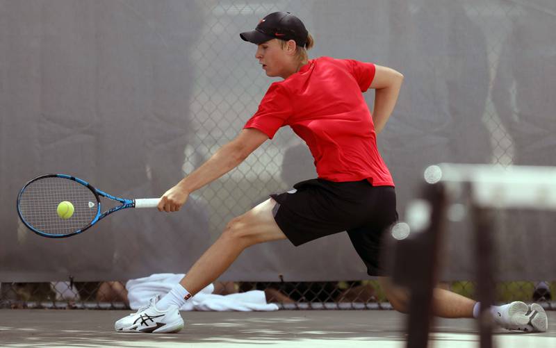 Hinsdale Central's Alex Kotarski returns a shot in the championship 2A singles match during the IHSA State Tennis Finals Saturday May 27, 2023 in Palatine.